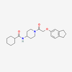 molecular formula C23H32N2O3 B6919259 N-[1-[2-(2,3-dihydro-1H-inden-5-yloxy)acetyl]piperidin-4-yl]cyclohexanecarboxamide 