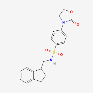 molecular formula C19H20N2O4S B6929776 N-(2,3-dihydro-1H-inden-1-ylmethyl)-4-(2-oxo-1,3-oxazolidin-3-yl)benzenesulfonamide 