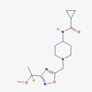 molecular formula C15H24N4O3 B6930429 N-[1-[[3-(1-methoxyethyl)-1,2,4-oxadiazol-5-yl]methyl]piperidin-4-yl]cyclopropanecarboxamide 