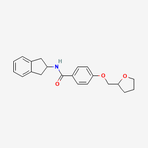 molecular formula C21H23NO3 B6930672 N-(2,3-dihydro-1H-inden-2-yl)-4-(oxolan-2-ylmethoxy)benzamide 