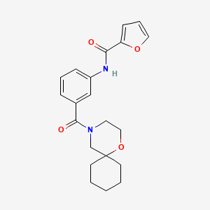 molecular formula C21H24N2O4 B6932079 N-[3-(1-oxa-4-azaspiro[5.5]undecane-4-carbonyl)phenyl]furan-2-carboxamide 