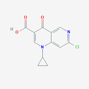 molecular formula C12H9ClN2O3 B069355 7-Chloro-1-cyclopropyl-4-oxo-1,4-dihydro-1,6-naphthyridine-3-carboxylic acid CAS No. 181262-12-4