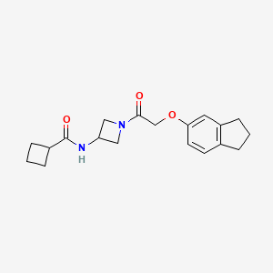 molecular formula C19H24N2O3 B6941574 N-[1-[2-(2,3-dihydro-1H-inden-5-yloxy)acetyl]azetidin-3-yl]cyclobutanecarboxamide 