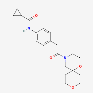molecular formula C20H26N2O4 B6942264 N-[4-[2-(1,9-dioxa-4-azaspiro[5.5]undecan-4-yl)-2-oxoethyl]phenyl]cyclopropanecarboxamide 