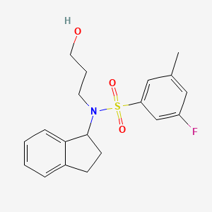 molecular formula C19H22FNO3S B6944102 N-(2,3-dihydro-1H-inden-1-yl)-3-fluoro-N-(3-hydroxypropyl)-5-methylbenzenesulfonamide 