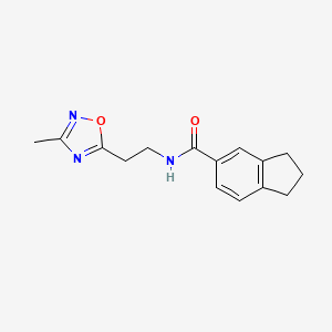 molecular formula C15H17N3O2 B6954400 N-[2-(3-methyl-1,2,4-oxadiazol-5-yl)ethyl]-2,3-dihydro-1H-indene-5-carboxamide 