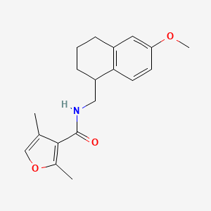 molecular formula C19H23NO3 B6958080 N-[(6-methoxy-1,2,3,4-tetrahydronaphthalen-1-yl)methyl]-2,4-dimethylfuran-3-carboxamide 