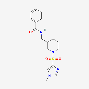 molecular formula C17H22N4O3S B6972303 N-[[1-(1-methylimidazol-4-yl)sulfonylpiperidin-3-yl]methyl]benzamide 