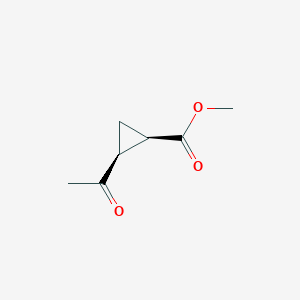 molecular formula C7H10O3 B069746 Cyclopropanecarboxylic acid, 2-acetyl-, methyl ester, (1R-cis)-(9CI) CAS No. 178033-26-6