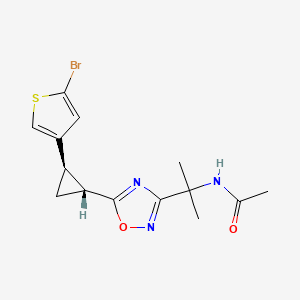 molecular formula C14H16BrN3O2S B6997768 N-[2-[5-[(1R,2R)-2-(5-bromothiophen-3-yl)cyclopropyl]-1,2,4-oxadiazol-3-yl]propan-2-yl]acetamide 