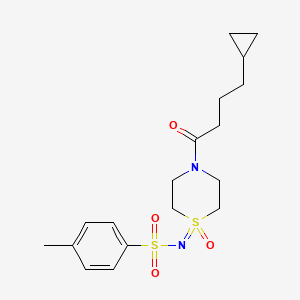 molecular formula C18H26N2O4S2 B7005549 N-[4-(4-cyclopropylbutanoyl)-1-oxo-1,4-thiazinan-1-ylidene]-4-methylbenzenesulfonamide 