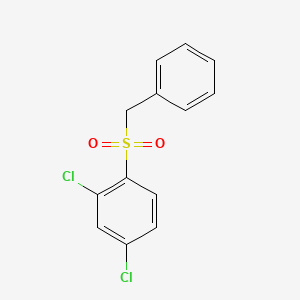 molecular formula C13H10Cl2O2S B7017938 1-Benzylsulfonyl-2,4-dichlorobenzene 