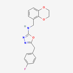 molecular formula C18H16FN3O3 B7019246 N-(2,3-dihydro-1,4-benzodioxin-5-ylmethyl)-5-[(4-fluorophenyl)methyl]-1,3,4-oxadiazol-2-amine 