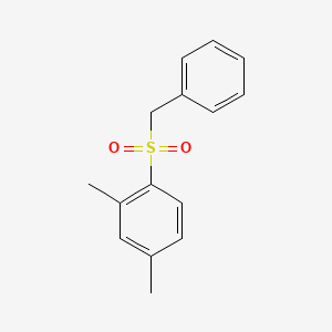 molecular formula C15H16O2S B7020007 1-Benzylsulfonyl-2,4-dimethylbenzene 
