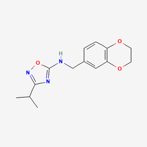 molecular formula C14H17N3O3 B7033436 N-(2,3-dihydro-1,4-benzodioxin-6-ylmethyl)-3-propan-2-yl-1,2,4-oxadiazol-5-amine 