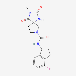 molecular formula C17H19FN4O3 B7033863 N-(4-fluoro-2,3-dihydro-1H-inden-1-yl)-3-methyl-2,4-dioxo-1,3,7-triazaspiro[4.4]nonane-7-carboxamide 