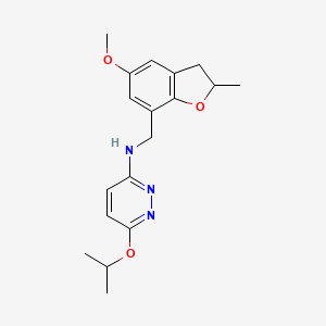 molecular formula C18H23N3O3 B7038325 N-[(5-methoxy-2-methyl-2,3-dihydro-1-benzofuran-7-yl)methyl]-6-propan-2-yloxypyridazin-3-amine 