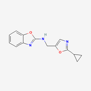 molecular formula C14H13N3O2 B7043243 N-[(2-cyclopropyl-1,3-oxazol-5-yl)methyl]-1,3-benzoxazol-2-amine 