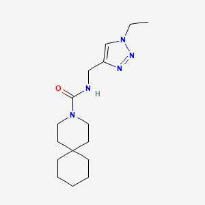 molecular formula C16H27N5O B7048171 N-[(1-ethyltriazol-4-yl)methyl]-3-azaspiro[5.5]undecane-3-carboxamide 