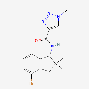 molecular formula C15H17BrN4O B7060459 N-(4-bromo-2,2-dimethyl-1,3-dihydroinden-1-yl)-1-methyltriazole-4-carboxamide 