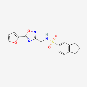 molecular formula C16H15N3O4S B7060646 N-[[5-(furan-2-yl)-1,2,4-oxadiazol-3-yl]methyl]-2,3-dihydro-1H-indene-5-sulfonamide 