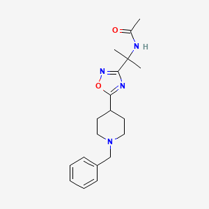 molecular formula C19H26N4O2 B7062910 N-[2-[5-(1-benzylpiperidin-4-yl)-1,2,4-oxadiazol-3-yl]propan-2-yl]acetamide 