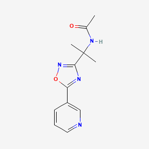 molecular formula C12H14N4O2 B7062945 N-[2-(5-pyridin-3-yl-1,2,4-oxadiazol-3-yl)propan-2-yl]acetamide 