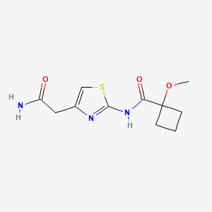 molecular formula C11H15N3O3S B7063729 N-[4-(2-amino-2-oxoethyl)-1,3-thiazol-2-yl]-1-methoxycyclobutane-1-carboxamide 