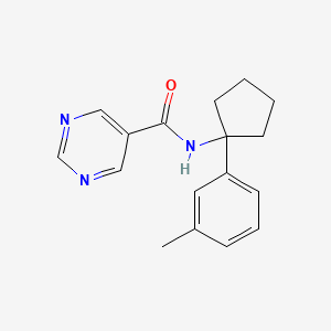 molecular formula C17H19N3O B7067582 N-[1-(3-methylphenyl)cyclopentyl]pyrimidine-5-carboxamide 
