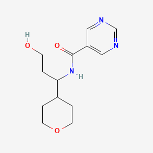 molecular formula C13H19N3O3 B7068875 N-[3-hydroxy-1-(oxan-4-yl)propyl]pyrimidine-5-carboxamide 