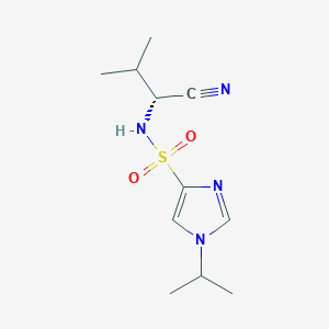 molecular formula C11H18N4O2S B7069753 N-[(1R)-1-cyano-2-methylpropyl]-1-propan-2-ylimidazole-4-sulfonamide 