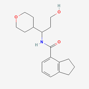 molecular formula C18H25NO3 B7071124 N-[3-hydroxy-1-(oxan-4-yl)propyl]-2,3-dihydro-1H-indene-4-carboxamide 
