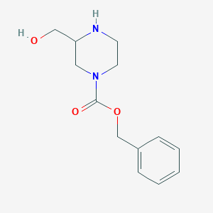 molecular formula C13H18N2O3 B070753 Benzyl 3-(hydroxymethyl)piperazine-1-carboxylate CAS No. 191739-40-9