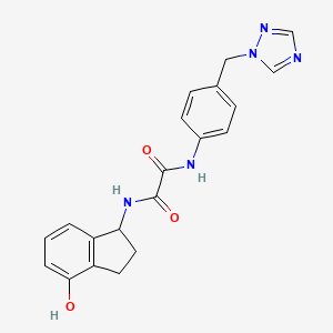 molecular formula C20H19N5O3 B7078036 N-(4-hydroxy-2,3-dihydro-1H-inden-1-yl)-N'-[4-(1,2,4-triazol-1-ylmethyl)phenyl]oxamide 