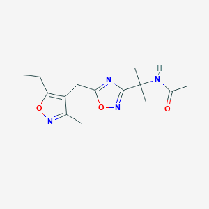 molecular formula C15H22N4O3 B7082036 N-[2-[5-[(3,5-diethyl-1,2-oxazol-4-yl)methyl]-1,2,4-oxadiazol-3-yl]propan-2-yl]acetamide 