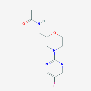 molecular formula C11H15FN4O2 B7084178 N-[[4-(5-fluoropyrimidin-2-yl)morpholin-2-yl]methyl]acetamide 