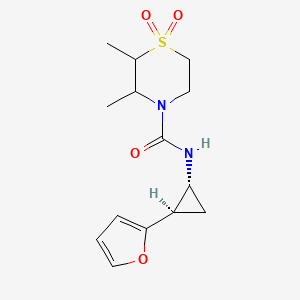molecular formula C14H20N2O4S B7087345 N-[(1R,2R)-2-(furan-2-yl)cyclopropyl]-2,3-dimethyl-1,1-dioxo-1,4-thiazinane-4-carboxamide 