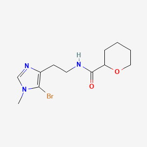 molecular formula C12H18BrN3O2 B7095274 N-[2-(5-bromo-1-methylimidazol-4-yl)ethyl]oxane-2-carboxamide 