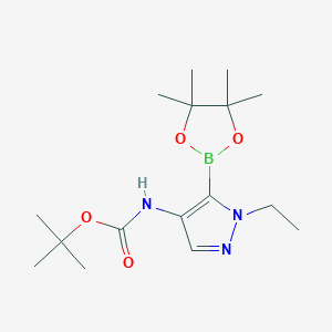 molecular formula C16H28BN3O4 B7119735 tert-Butyl N-[1-ethyl-5-(tetramethyl-1,3,2-dioxaborolan-2-yl)-1H-pyrazol-4-yl]carbamate 