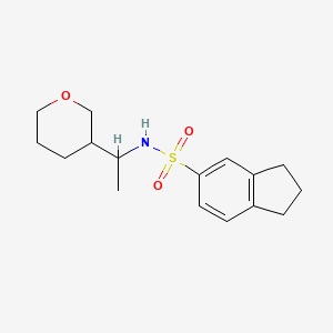 molecular formula C16H23NO3S B7121475 N-[1-(oxan-3-yl)ethyl]-2,3-dihydro-1H-indene-5-sulfonamide 