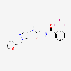 molecular formula C18H19F3N4O3 B7140090 N-[2-oxo-2-[[1-(oxolan-2-ylmethyl)pyrazol-4-yl]amino]ethyl]-2-(trifluoromethyl)benzamide 
