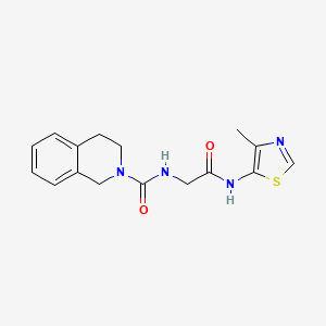 molecular formula C16H18N4O2S B7143823 N-[2-[(4-methyl-1,3-thiazol-5-yl)amino]-2-oxoethyl]-3,4-dihydro-1H-isoquinoline-2-carboxamide 