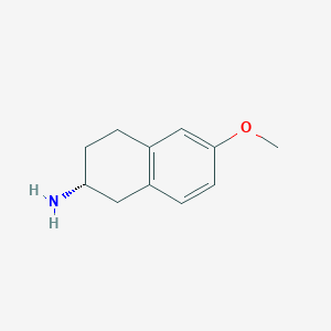 molecular formula C11H15NO B071441 (2R)-6-甲氧基-1,2,3,4-四氢萘-2-胺 CAS No. 177017-68-4