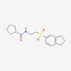 molecular formula C17H23NO3S B7146997 N-[2-(2,3-dihydro-1H-inden-5-ylsulfonyl)ethyl]cyclopentanecarboxamide 