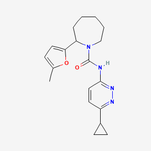 molecular formula C19H24N4O2 B7149406 N-(6-cyclopropylpyridazin-3-yl)-2-(5-methylfuran-2-yl)azepane-1-carboxamide 