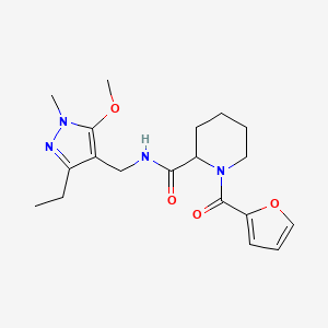 molecular formula C19H26N4O4 B7159526 N-[(3-ethyl-5-methoxy-1-methylpyrazol-4-yl)methyl]-1-(furan-2-carbonyl)piperidine-2-carboxamide 