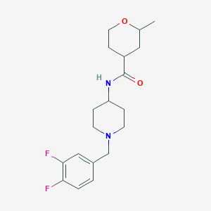 molecular formula C19H26F2N2O2 B7161776 N-[1-[(3,4-difluorophenyl)methyl]piperidin-4-yl]-2-methyloxane-4-carboxamide 
