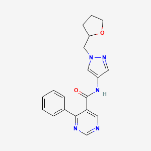 molecular formula C19H19N5O2 B7162933 N-[1-(oxolan-2-ylmethyl)pyrazol-4-yl]-4-phenylpyrimidine-5-carboxamide 