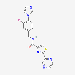 molecular formula C18H13FN6OS B7169672 N-[(3-fluoro-4-imidazol-1-ylphenyl)methyl]-2-pyrazin-2-yl-1,3-thiazole-4-carboxamide 