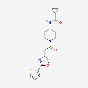 molecular formula C18H21N3O3S B7172041 N-[1-[2-(2-thiophen-2-yl-1,3-oxazol-4-yl)acetyl]piperidin-4-yl]cyclopropanecarboxamide 